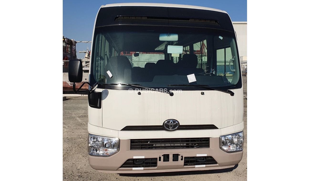 Toyota Coaster 2020YM COASTER DIESEL 23 STR 4.2 LTRS- limited stock- white/Grey Available- petrol available