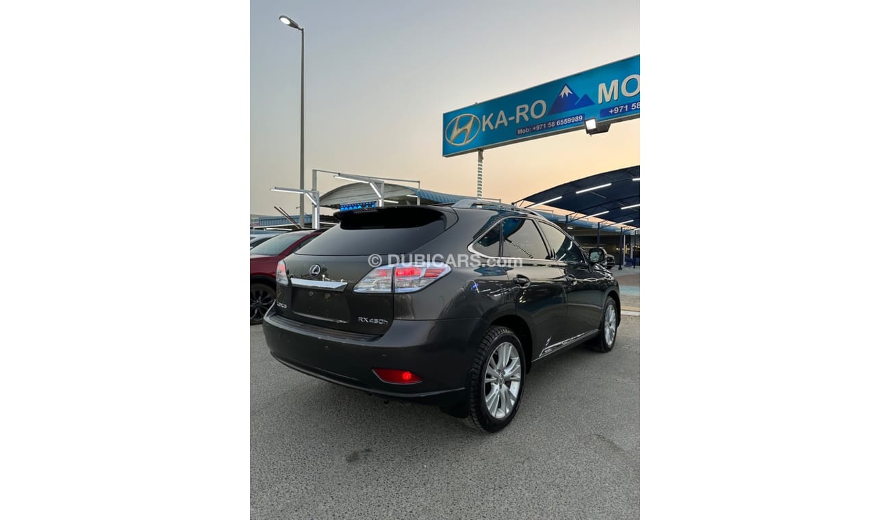 Lexus RX450hL Lexus RX 450 hybrid with 3.5 engine in excellent condition full floor Nice in a beautiful color.