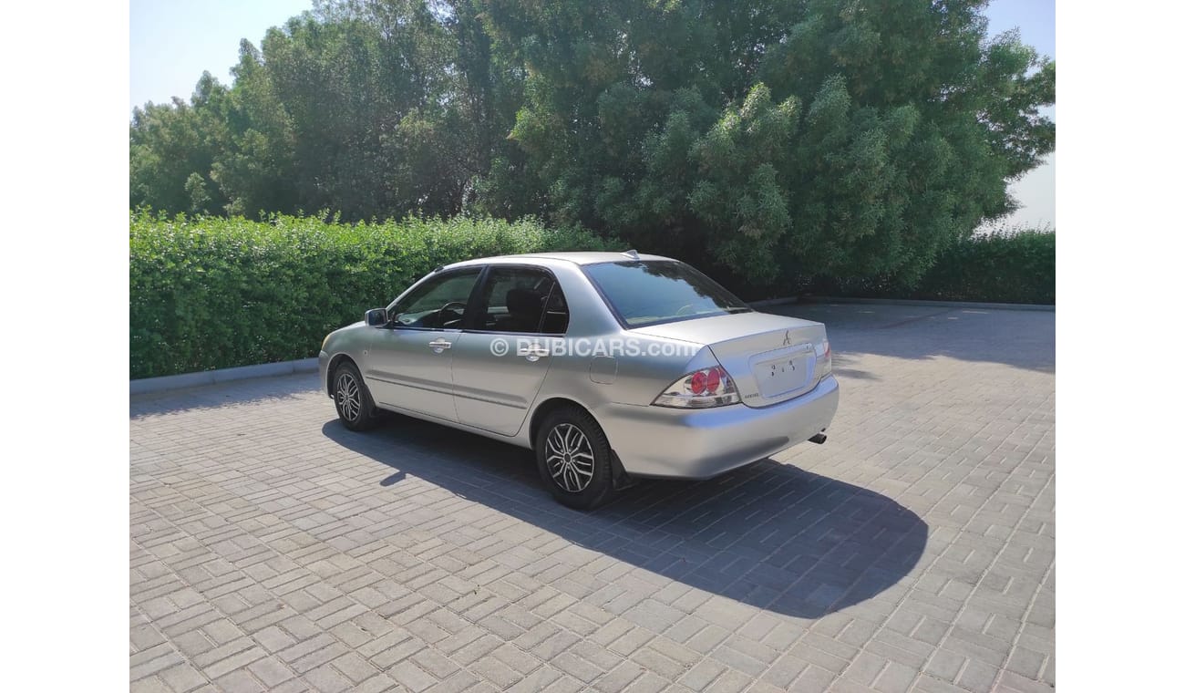 ميتسوبيشي لانسر Mitsubishi Lancer 2004 1.6 Gcc manual