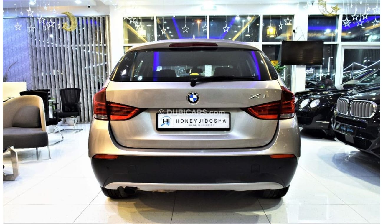 BMW X1 S Drive 2011 Model!! in Gold Color! GCC Specs