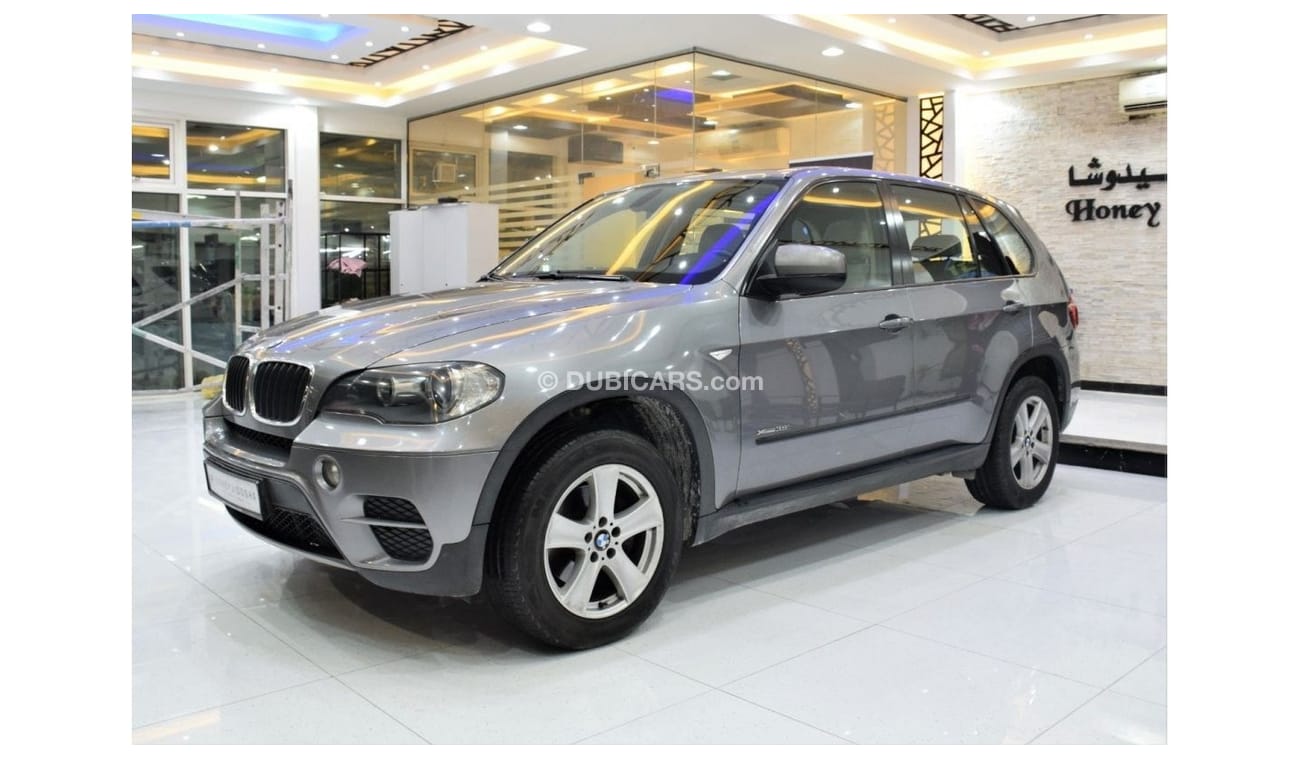 BMW X5 EXCELLENT DEAL for our BMW X5 xDrive35i ( 2011 Model! ) in Grey Color! GCC Specs