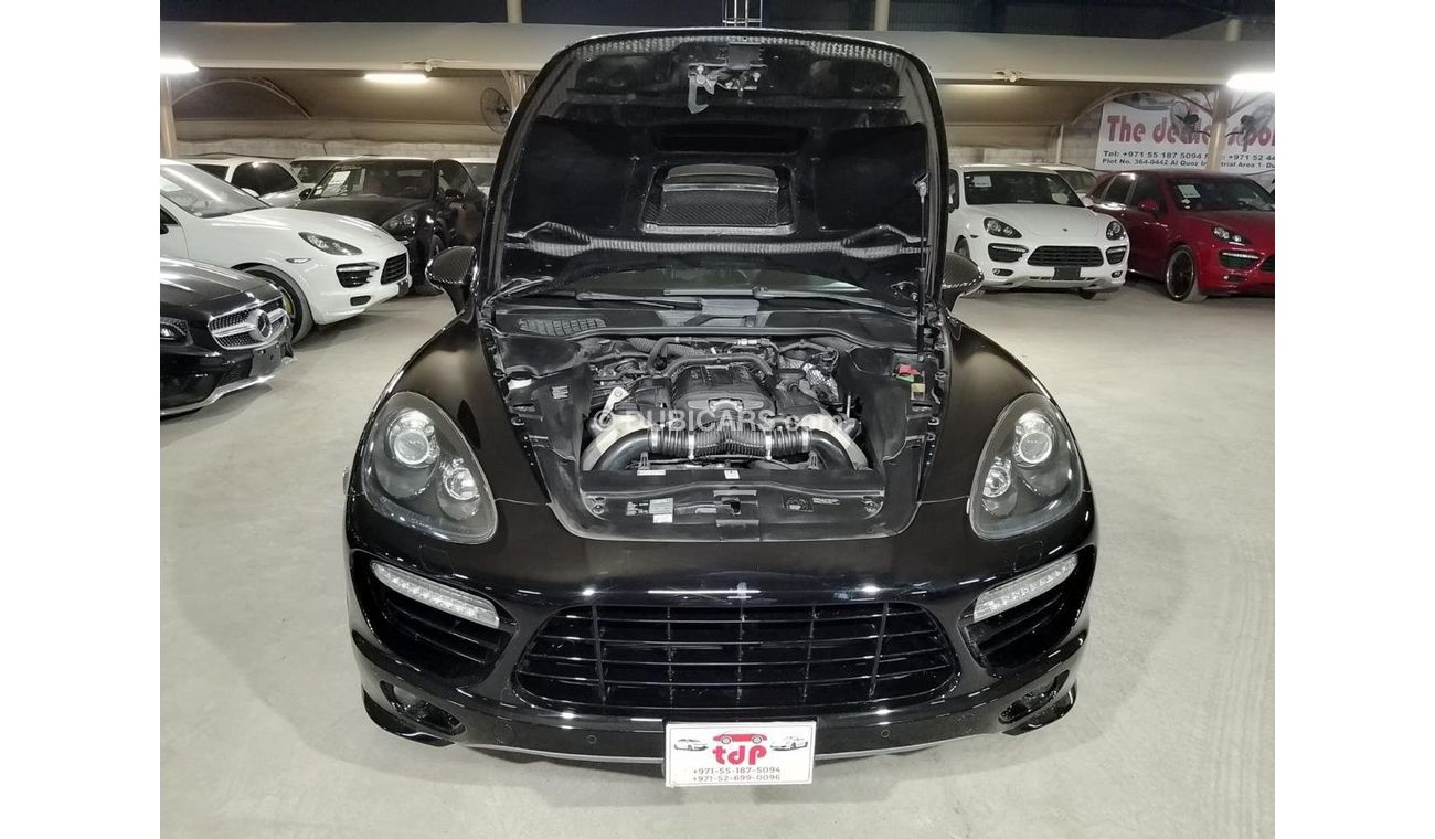 Porsche Cayenne Turbo 4.8L (500 HP) WITH MANSORY CARBON BONNET, MANSORY CARBON INTERIOR AND MORE..