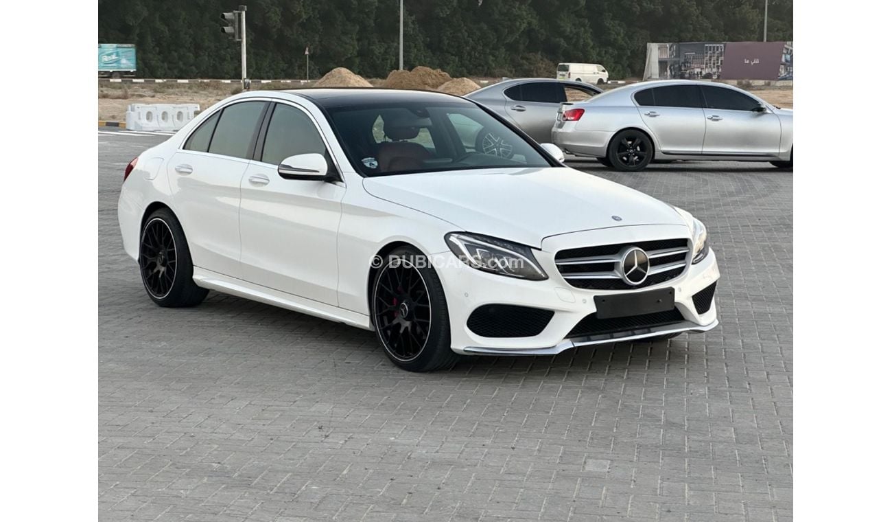 مرسيدس بنز C200 MODEL 2016 GCC CAR PERFECT CONDITION FULL OPTION PANORAMIC ROOF AMG