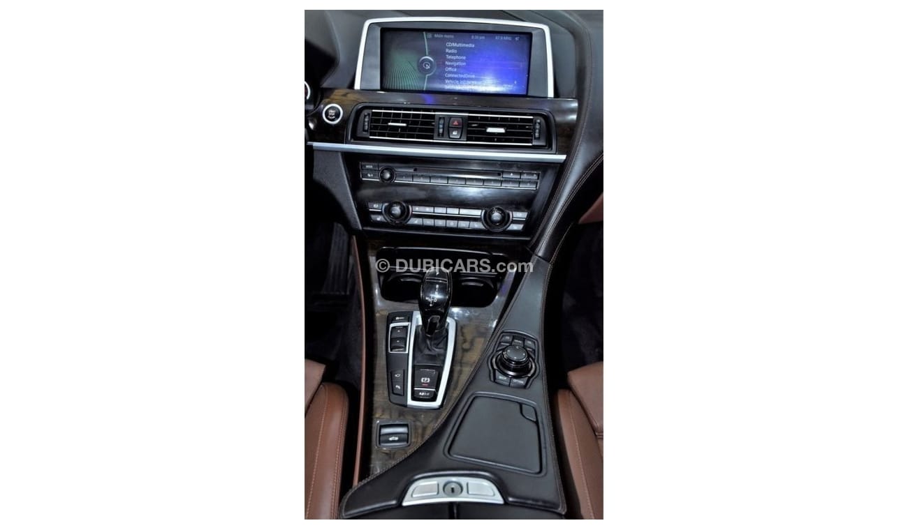 BMW 650i EXCELLENT DEAL for our BMW 650i CONVERTIBLE ( 2011 Model ) in White Color GCC Specs