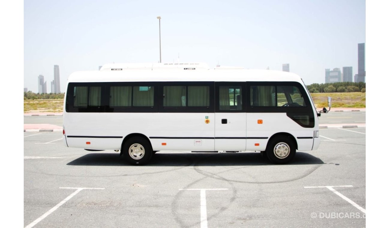 سي اتش تي سي Bus 2023 CHTC HQG6730 7.3m Coaster 28-Seater 3.0L 4-Cyl Diesel M/T RWD