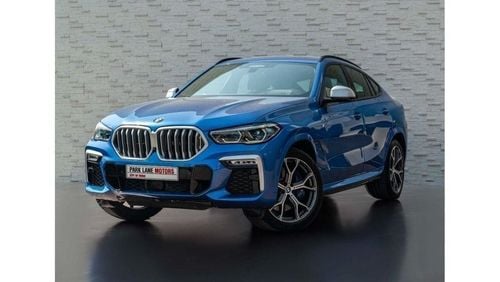 بي أم دبليو X6 AED 4,781 PM • X6 M50i • 4.4L TURBOCHARGED V8 • LOW KM • OFFICIAL BMW WARRANTY + SERVICE PLAN UNTIL