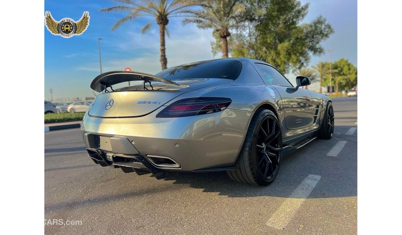 Mercedes-Benz SLS AMG Description For Sale: 2011 Mercedes-Benz SLS AMG Mileage: 21,000 km Exterior: Silver Interior: Red F