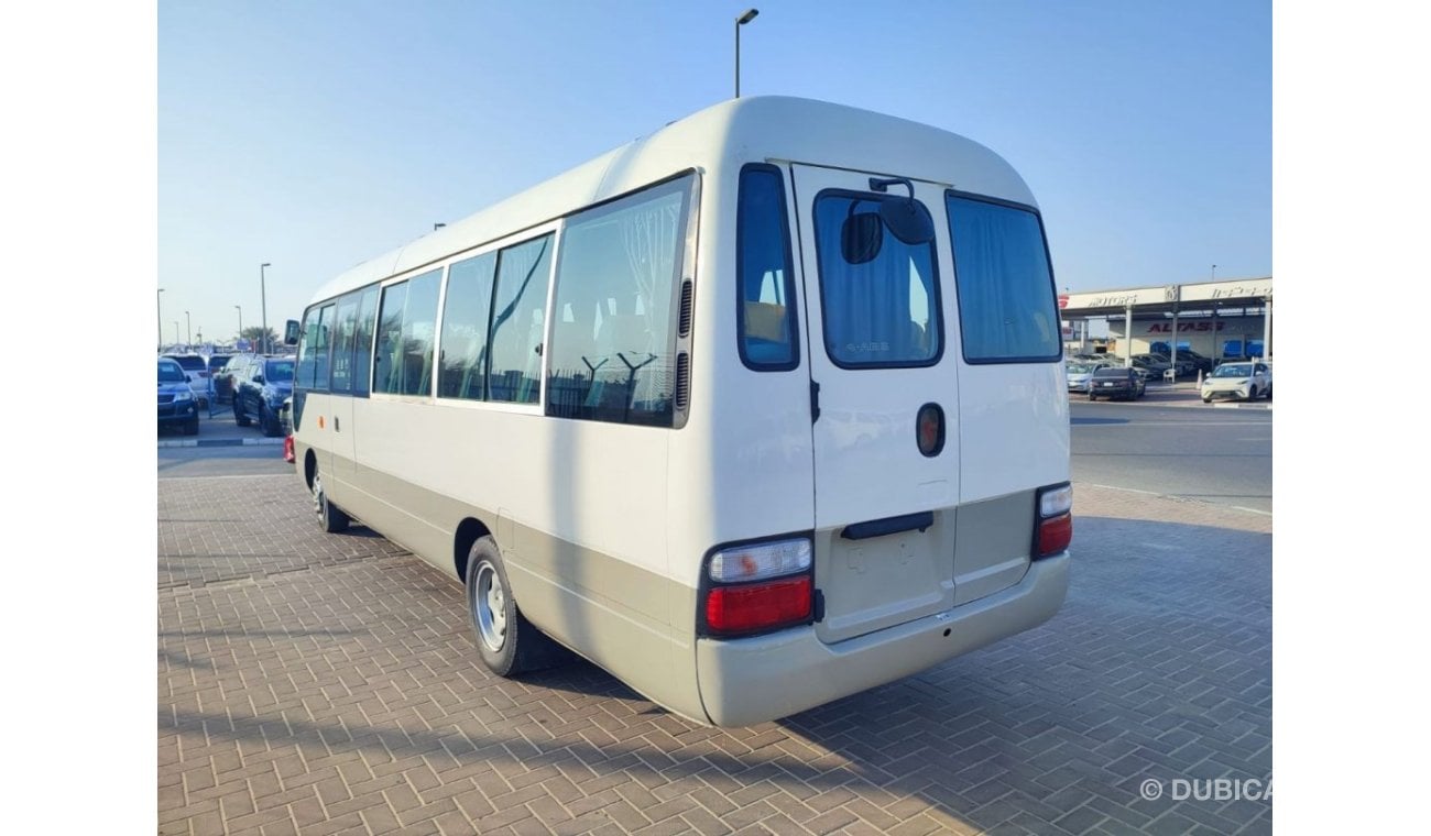 Toyota Coaster JTGEC538405000309 || 2008 WHITE GREY	4000	DIESEL	261785	RHD	MANUAL RIGHT HAND DRIVE.