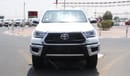 Toyota Hilux 2.4L diesel  . White 2024 model, M/T Wide body with Chrome bumper