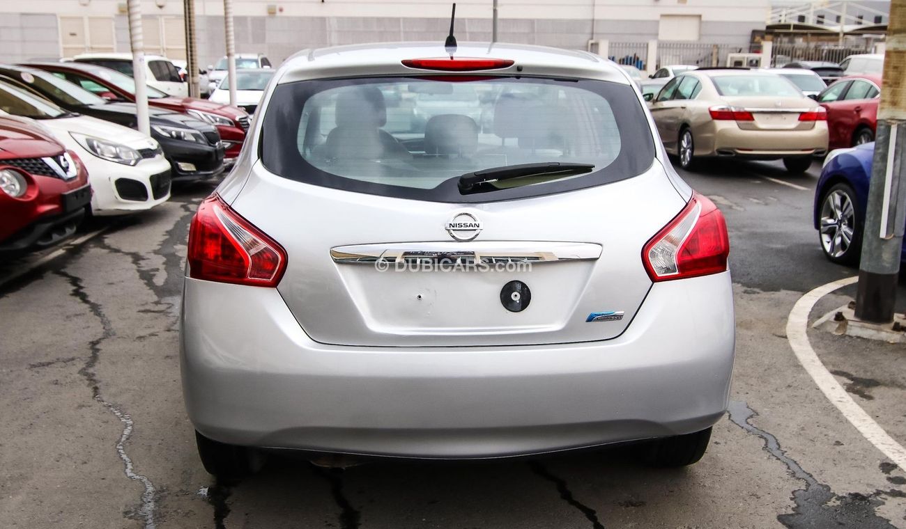 Nissan Tiida Pre-owned  for sale in Sharjah. Grey/Silver 2016 model, available at Wael Al Azzazi Shar