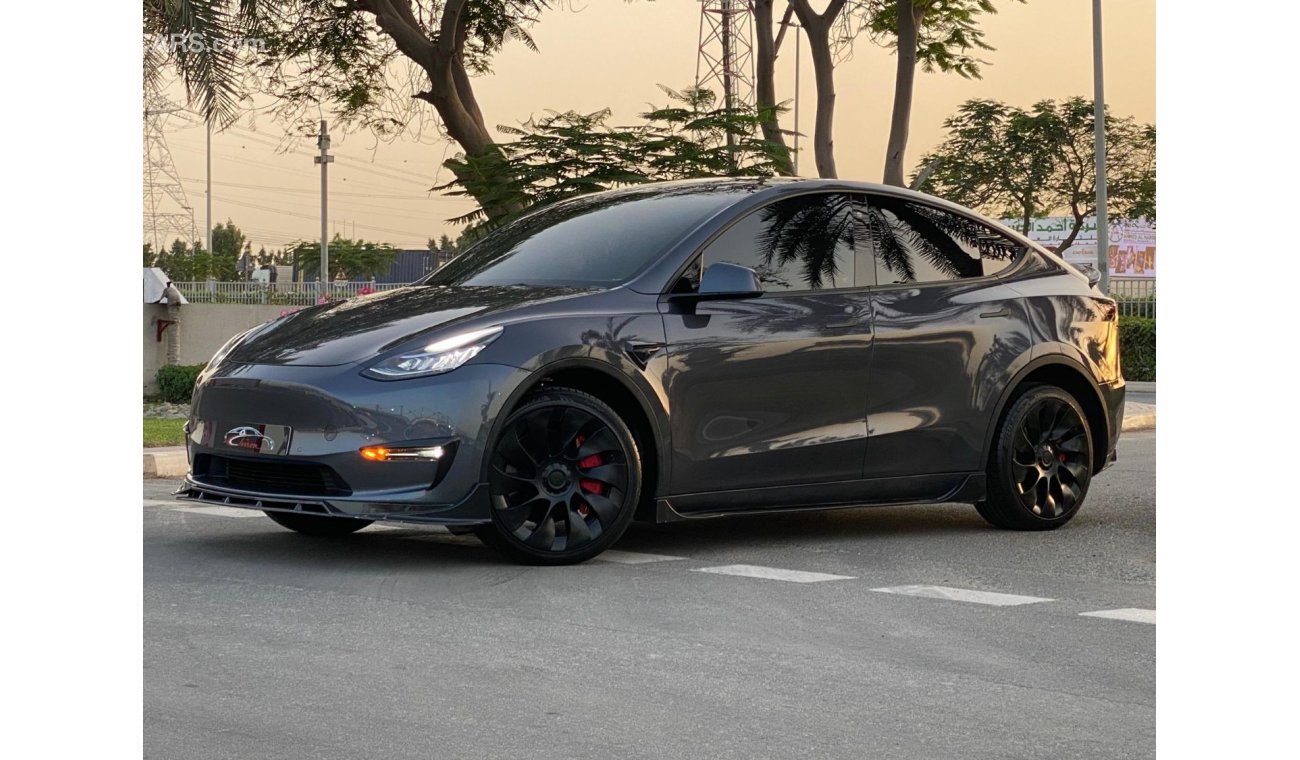 Tesla Model Y FULL BODY CARBON FIBER KIT - SPECIAL STEERING -WELL MAINTAINED