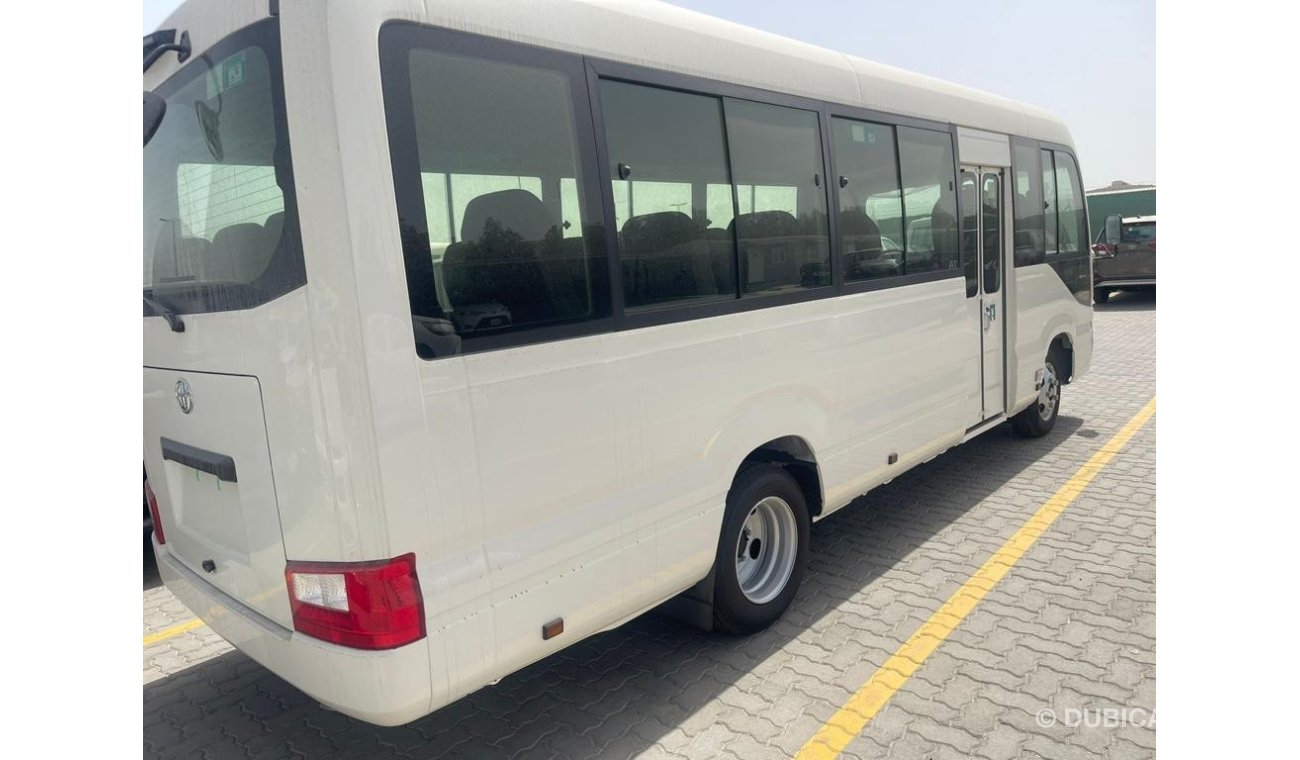 Toyota Coaster 4.2L DIESEL 23 SEATER WITH AUTO DOOR AND 3-P SEATBELT M/T, 2024 MODEL