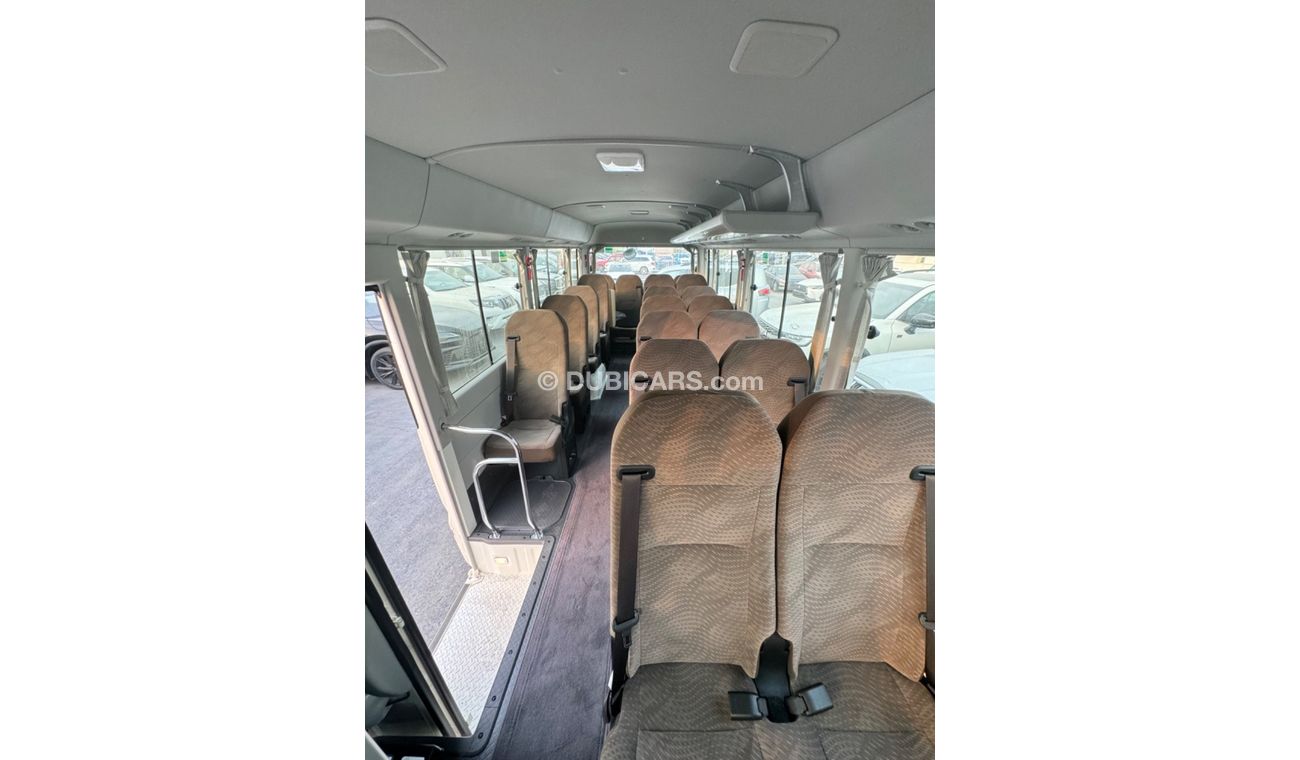 Toyota Coaster 2024 TOYOTA COSTER 4.0L DIESEL WITH COOLBOX, LUGGAGE RACK, CURTAINS, 22 SEATS MT