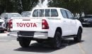 Toyota Hilux 2.4L diesel  . White 2023 model, M/T Wide body with Chrome bumper