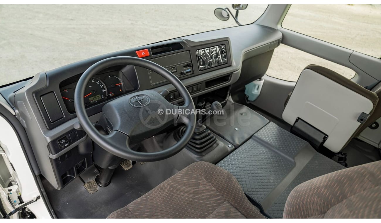 Toyota Coaster 2.7L PETROL 30-SEATER: WITH MANUAL AC, SNORKEL, AND ABS