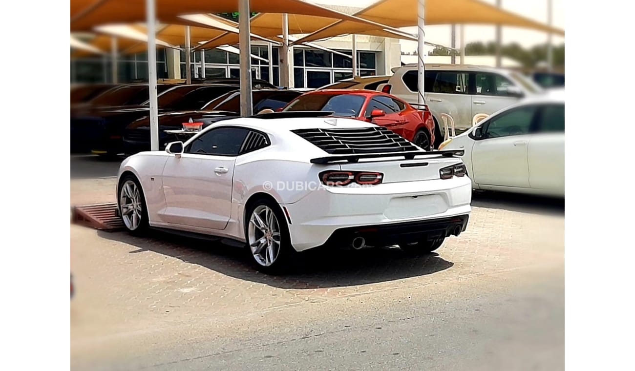 Chevrolet Camaro Chevrolet Camaro rs Model - 2021 Engine - v6 3.6L automatic gear Mileage - 13,000 White color Interi