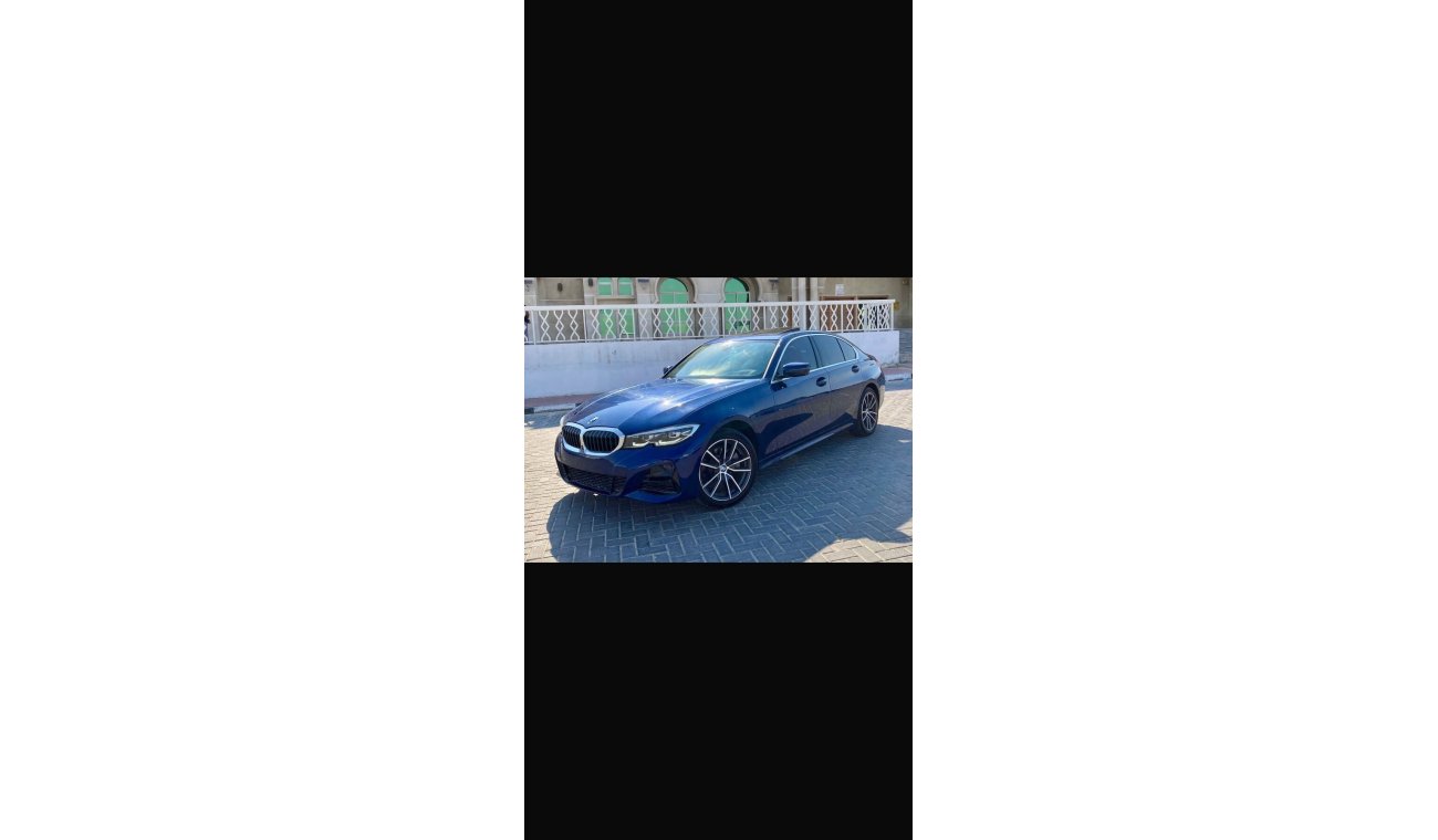 BMW 330i X drive exclusive very low km