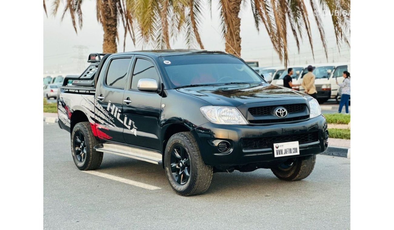 Toyota Hilux DOUBLE CABIN | PREMIUM SPORTS BAR WITH BASKET | 2009 | 2.7L PETROL | LHD | MANUAL | RED INTERIOR