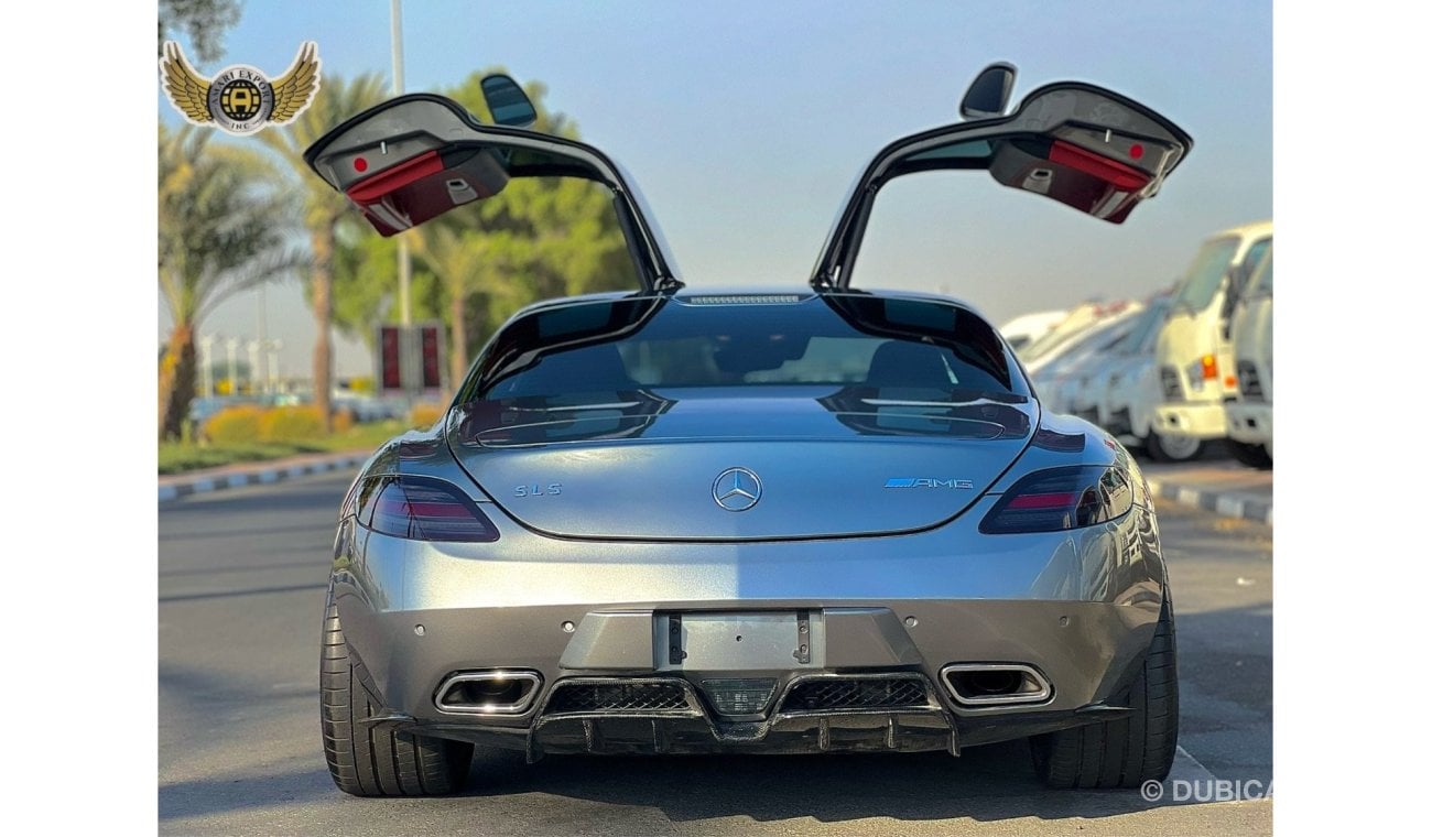 Mercedes-Benz SLS AMG Description For Sale: 2011 Mercedes-Benz SLS AMG Mileage: 21,000 km Exterior: Silver Interior: Red F