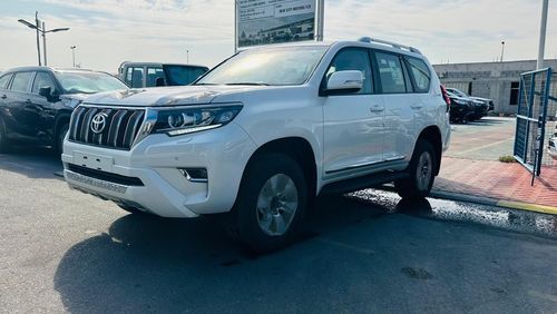 تويوتا برادو TOYOTA PRADO TXL 4.0L PETROL - MID+/O - A/T - S/D- WHITE - 2023