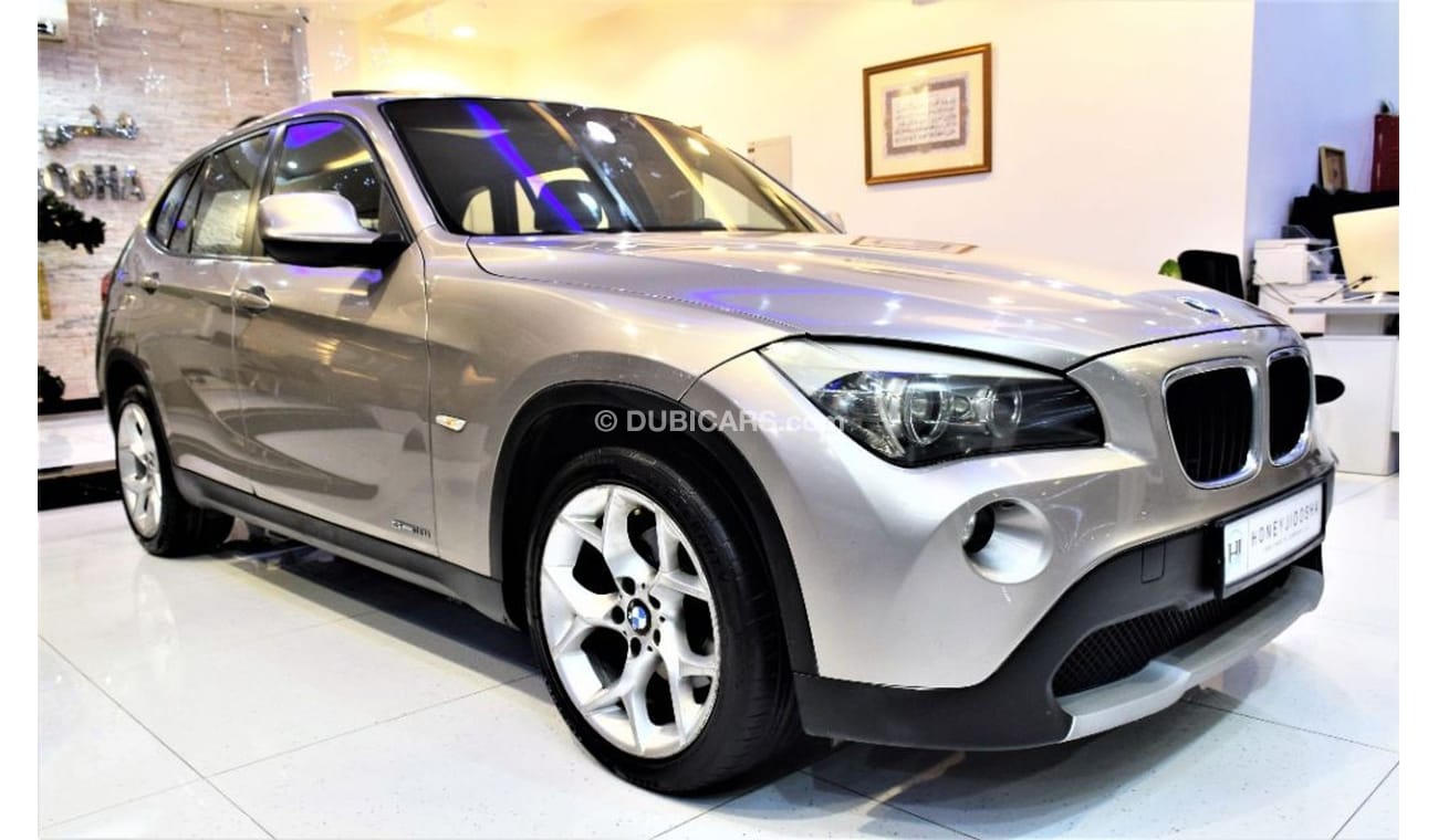 BMW X1 S Drive 2011 Model!! in Gold Color! GCC Specs