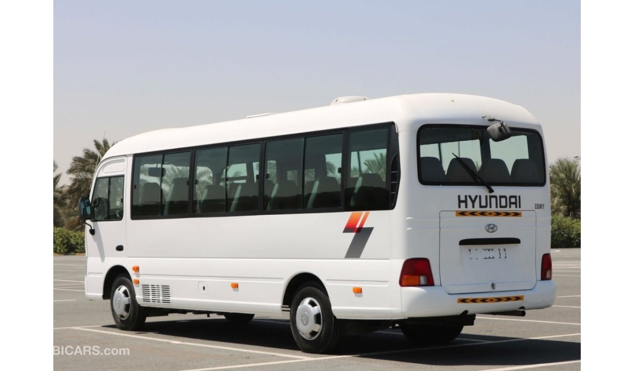 هيونداي كونتي 2015 | New Condition | Hyundai County Bus |  A/C - 30 Seater - DSL - Low Mileage | GCC SPECS