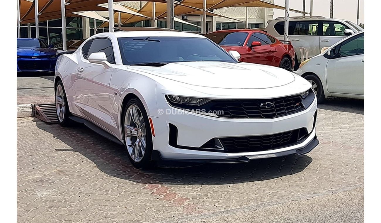 Chevrolet Camaro Chevrolet Camaro rs Model - 2021 Engine - v6 3.6L automatic gear Mileage - 13,000 White color Interi