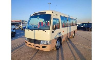 Toyota Coaster JTGFP518504500593 || TOYOTA COASTER (BUS) | || DIESEL || LHD || MANUAL