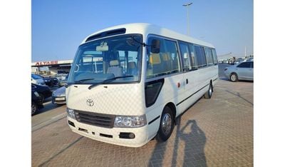 Toyota Coaster JTGEC58305000219 || COASTER (BUS) 2011 (29 -VIP SEATS ) CC4000 DIESEL RHD MANUAL ||ONLY EXPORT,