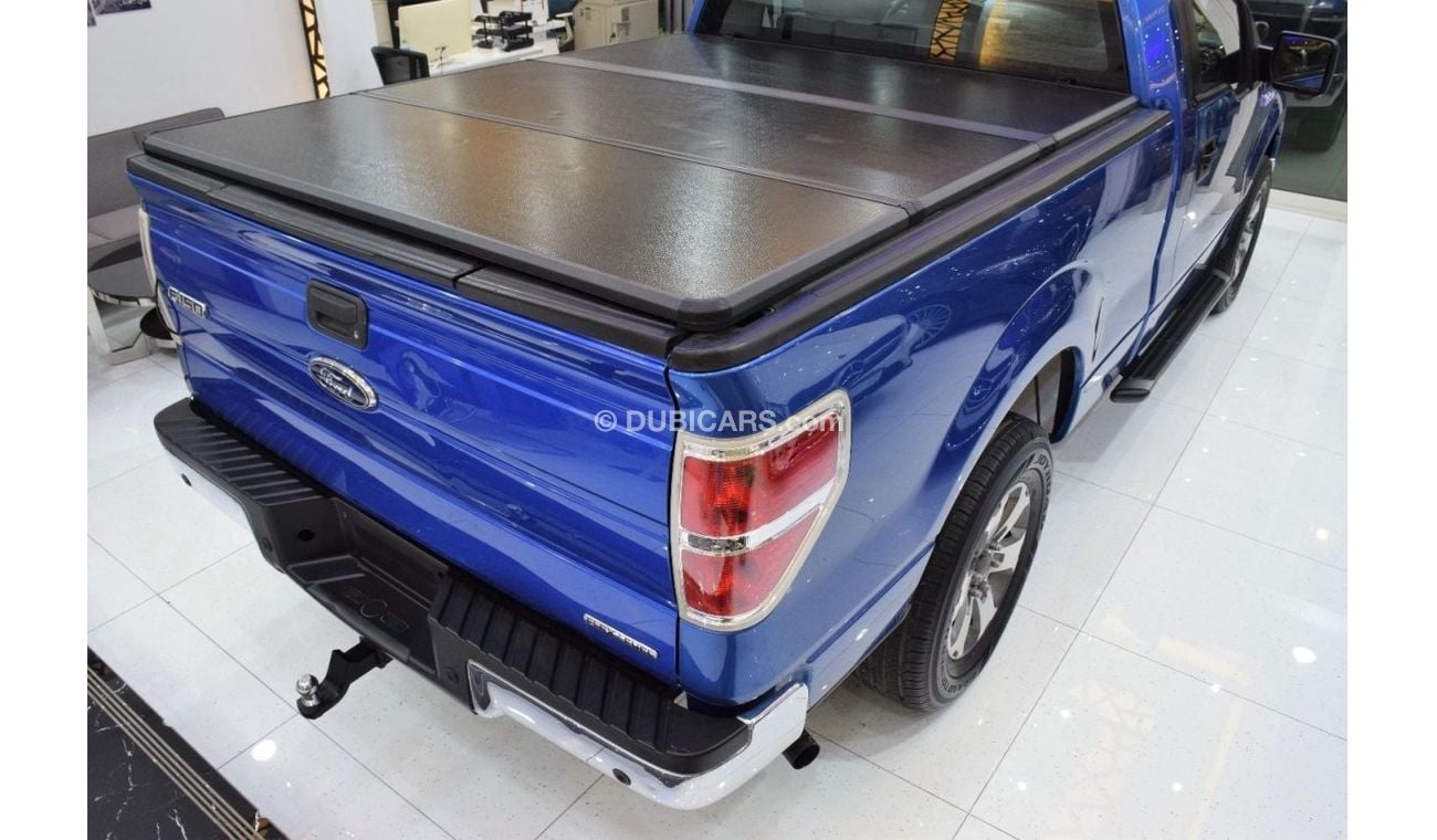 Ford F 150 XLT EXCELLENT DEAL for our Ford F-150 XLT 4x4 ( 2012 Model ) in Blue Color! GCC Specs