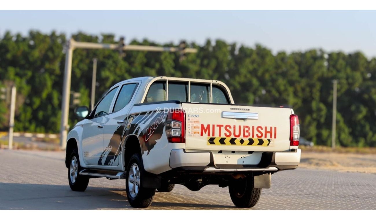 ميتسوبيشي L200 GL 2.5L Double Cab Utility 4WD Mitsubishi L200 2.4 L 2021GCC accident free in excellent condition 12