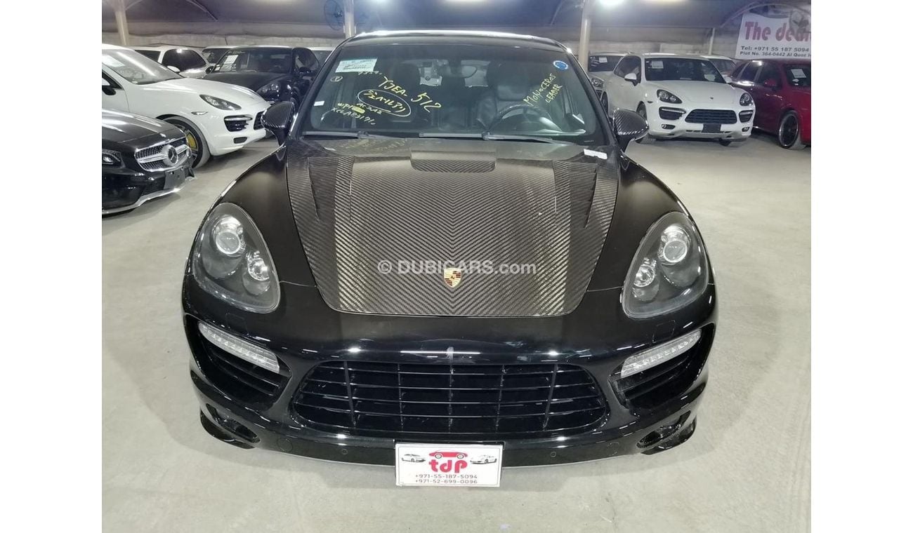 Porsche Cayenne Turbo 4.8L (500 HP) WITH MANSORY CARBON BONNET, MANSORY CARBON INTERIOR AND MORE..