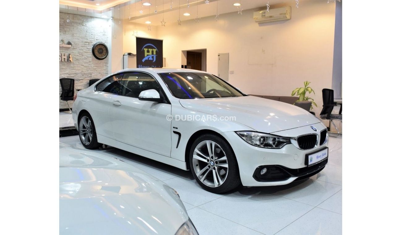 BMW 420i EXCELLENT DEAL for our BMW 420i Sport ( 435i Badge ) ( 2015 Model! ) in White Color! GCC Specs