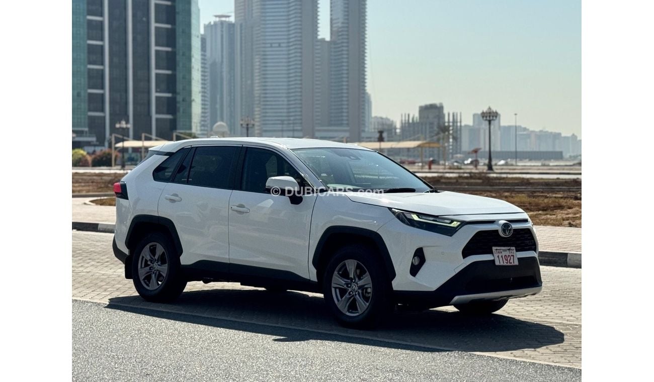 Toyota RAV4 Toyota RAV4 2024 Hybrid – White 	•	Engine & Performance: 2.5L 4-cylinder hybrid engine paired with a