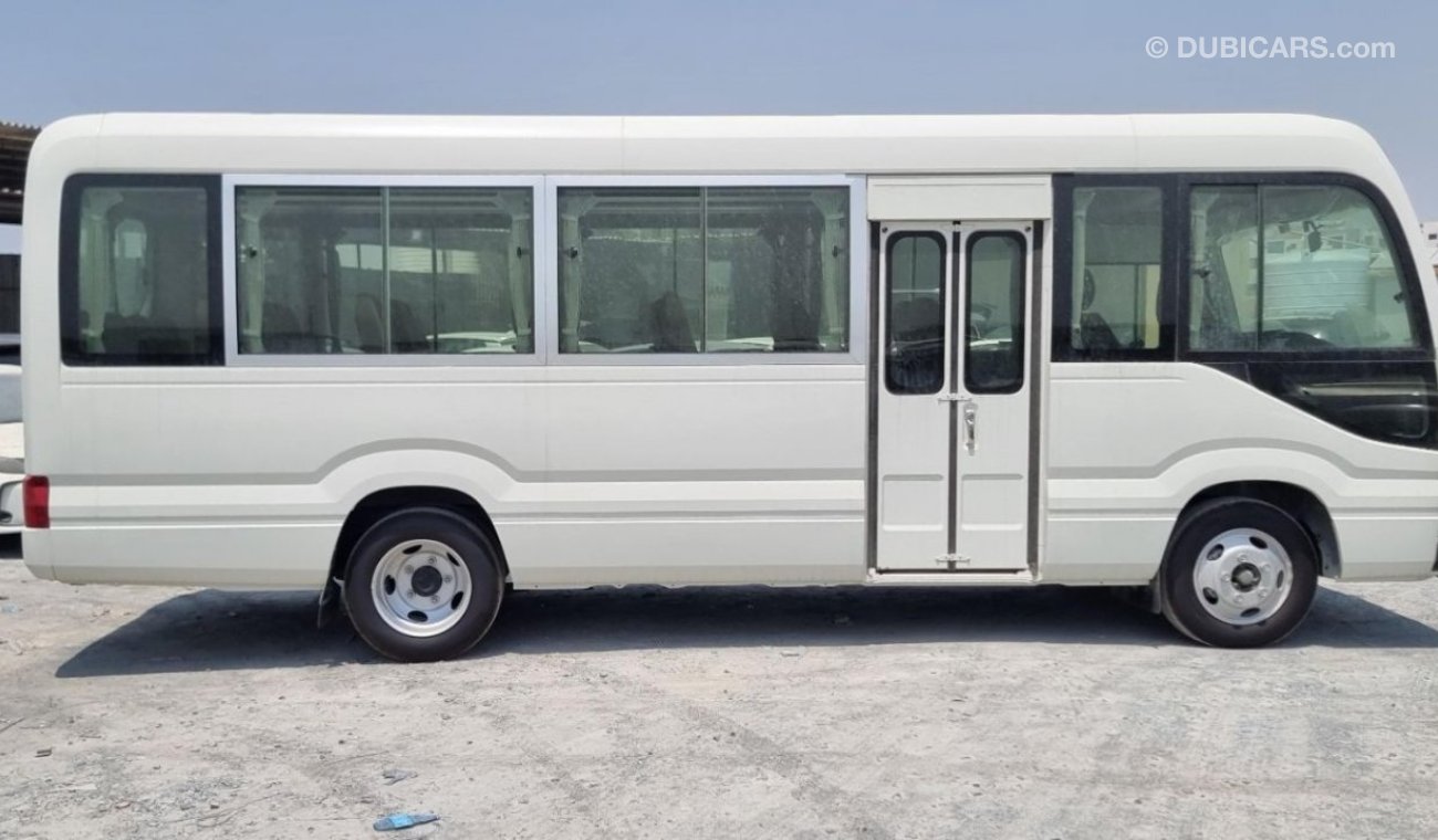 تويوتا كوستر 2024 Toyota Coaster High-Roof 30-Seater Snorkel 4.2L 6-Cyl Diesel M/T RWD (Africa only)