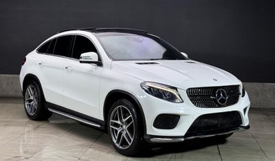 مرسيدس بنز GLE 350 The Mercedes-Benz GLE 350d Coupe in white is a stunning blend of luxury, power, and sporty design. H