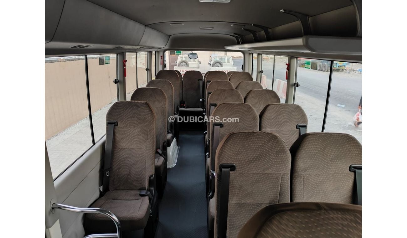 تويوتا كوستر 2024 Toyota Coaster High-Roof 23-Seater 4.0L 4-Cyl Turbo Diesel M/T RWD (Auto Closing Door) Export O