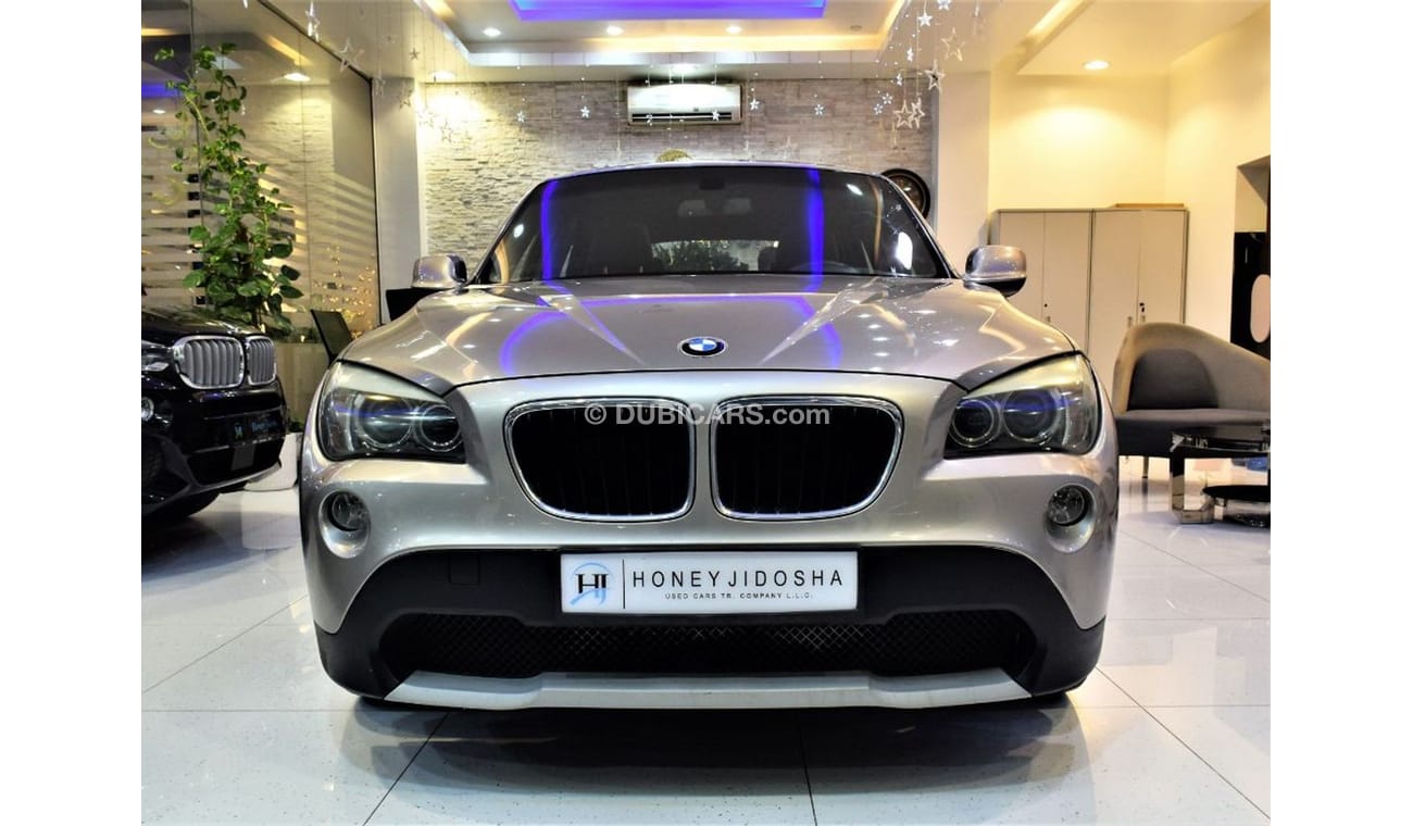 BMW X1 S Drive 2011 Model!! in Gold Color! GCC Specs