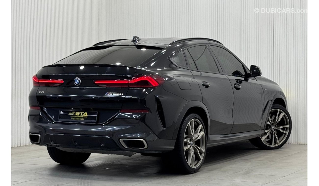 بي أم دبليو X6 50i Exclusive 4.4L 2021 BMW X6 M50i, 2026 AGMC Agency Warranty + Service Package, Full Service Histo