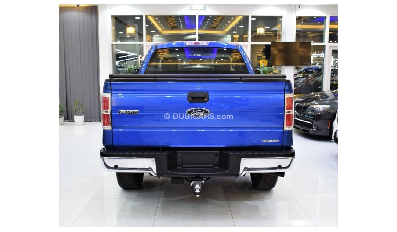 Ford F 150 XLT EXCELLENT DEAL for our Ford F-150 XLT 4x4 ( 2012 Model ) in Blue Color! GCC Specs