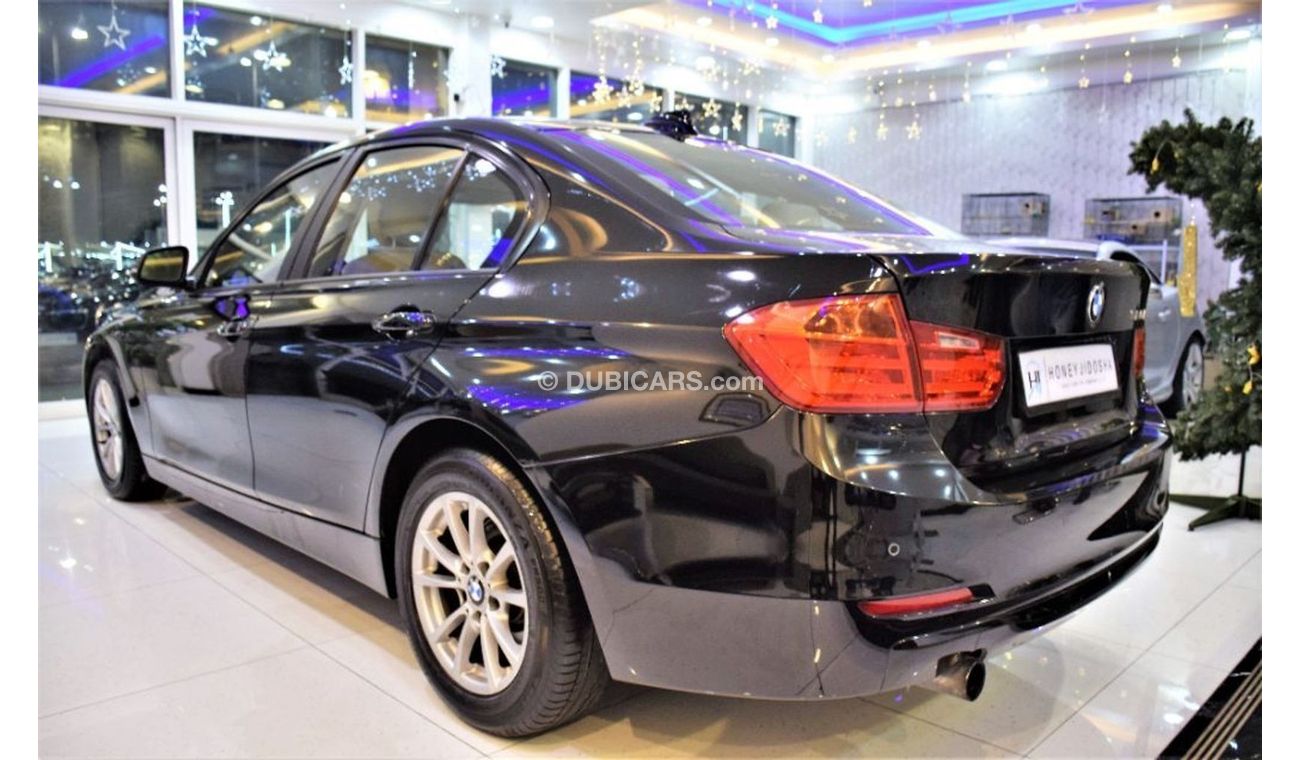 Used AMAZING BMW 320i 2013 Model!! in Black Color! GCC Specs 2013 for ...