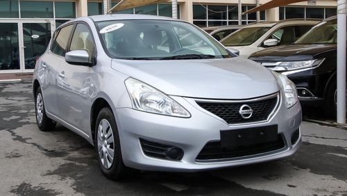 Nissan Tiida Pre-owned  for sale in Sharjah. Grey/Silver 2016 model, available at Wael Al Azzazi Shar