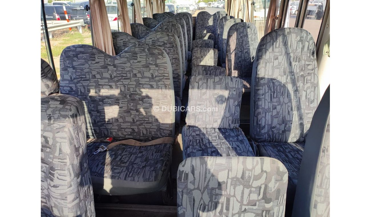 تويوتا كوستر HDB50-0002295 TOYOTA	COASTER (BUS)	CC4200	DIESEL RHD	AUTO	|| RHD