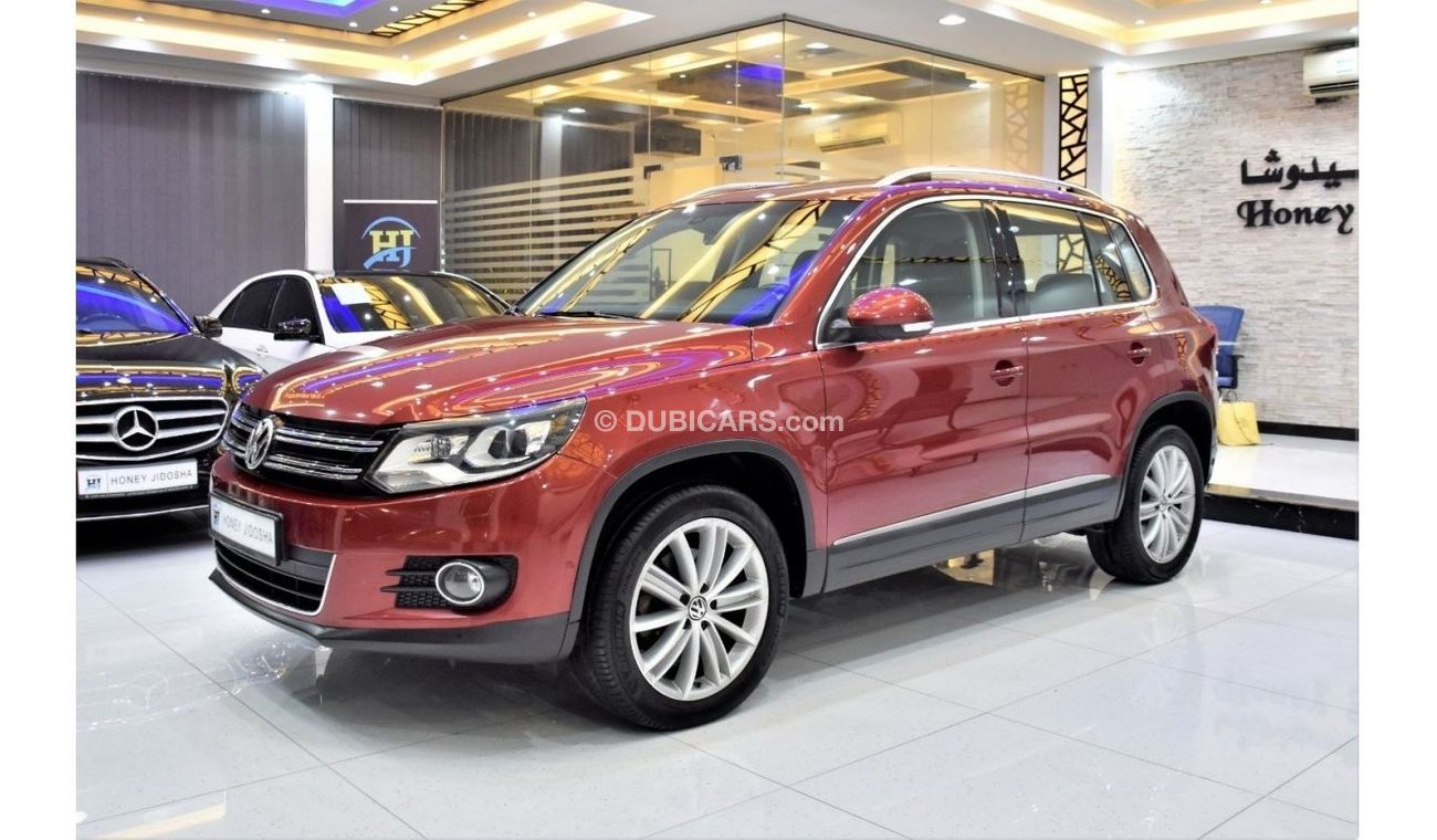 فولكس واجن تيجوان EXCELLENT DEAL for our Volkswagen Tiguan 2.0 TSi 4Motion ( 2015 Model ) in Red Color GCC Specs