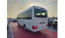 Toyota Coaster 2024 TOYOTA COASTER 4.0L DIESEL 22 SEATER WITH COOL BOX, CURTAINS, LUGGAGE RACK