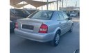 Mazda 323 2004 model, Gulf, 4 cylinder, odometer 75000