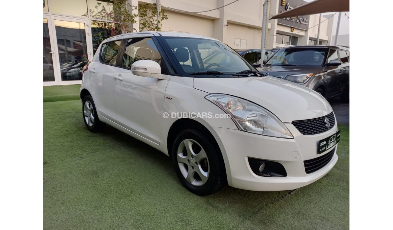 Suzuki Swift Gulf model 2014, center look, rims, air conditioning, without accidents, in excellent condition, you