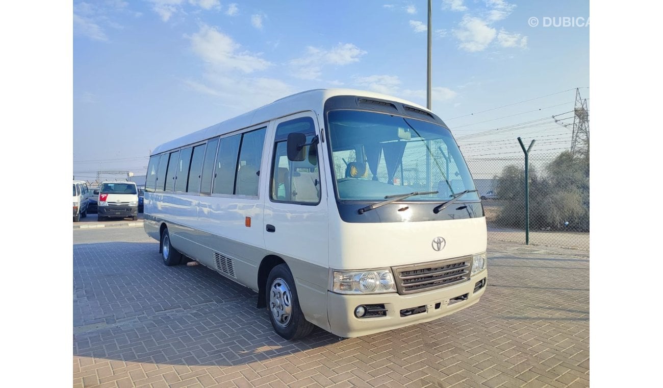 Toyota Coaster JTGEC538405000309 || 2008 WHITE GREY	4000	DIESEL	261785	RHD	MANUAL RIGHT HAND DRIVE.