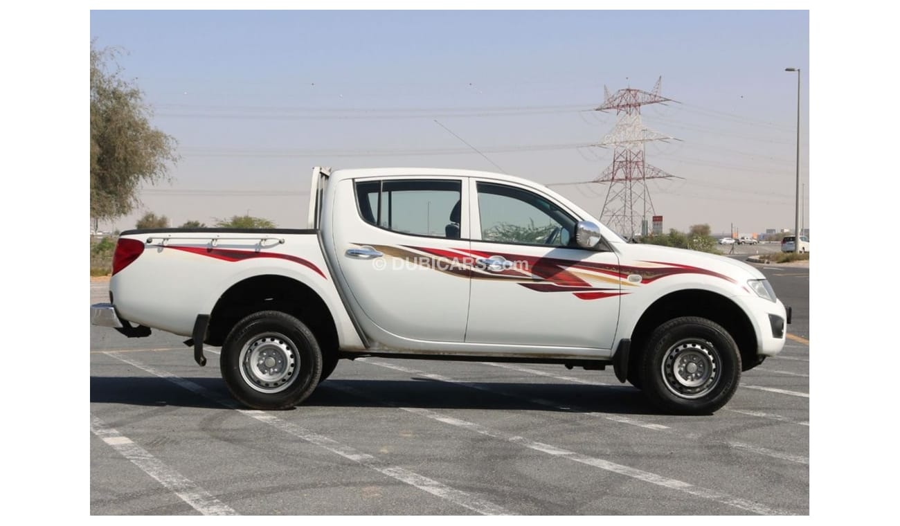 Mitsubishi L200 2015 |  L200 D/C 4X4 DIESEL MT WITH GCC SPECS AND EXCELLENT CONDITION