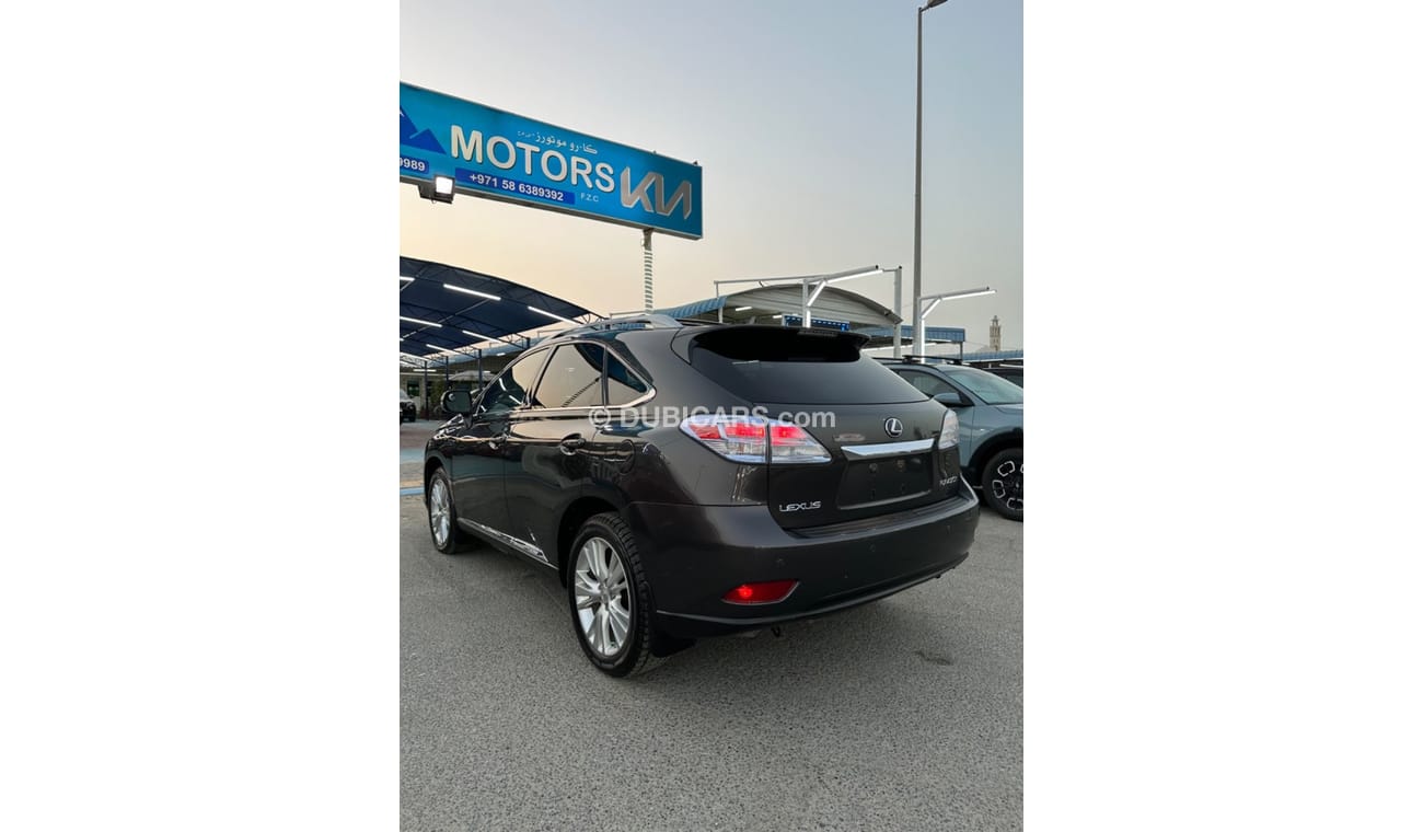 لكزس RX450hL Lexus RX 450 hybrid with 3.5 engine in excellent condition full floor Nice in a beautiful color.